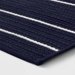 7'x10' Thin Stripe Rectangular Woven Outdoor Area Rug Navy/Ivory - Threshold™ -Threshold GUEST c60676dd ad1b 47c6 8285 df55d11b5f37