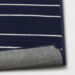 7'x10' Thin Stripe Rectangular Woven Outdoor Area Rug Navy/Ivory - Threshold™ -Threshold GUEST d8dd5e92 4349 401f 907f d39c6645ef8e